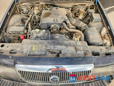 Zdjęcie 11 z 13 samochodu: 2003 MERCURY GRAND MARQUIS LS VIN:2MEFM75W83X663535 - miniatura
