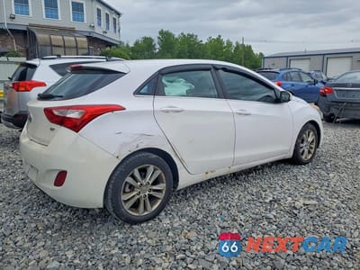 Trzecie zdjęcie samochodu z tyłu: 2014 HYUNDAI ELANTRA GT BASE VIN:KMHD35LH8EU235040 - miniatura