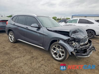 Czwarte zdjęcie samochodu z boku: 2015 BMW X1 XDRIVE28I VIN:WBAVL1C5XFVY36885 - miniatura