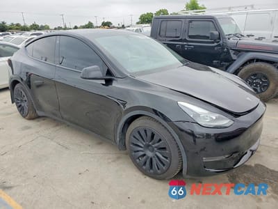 Czwarte zdjęcie samochodu z boku: 2022 TESLA MODEL Y VIN:7SAYGDEF9NF366571 - miniatura
