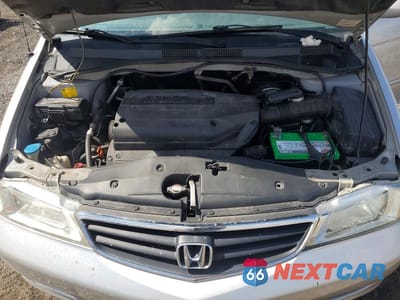 Zdjęcie 12 z 13 samochodu: 2004 HONDA ODYSSEY EX VIN:5FNRL18604B120045 - miniatura