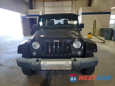 Piąte zdjęcie samochodu w środku: 2015 JEEP WRANGLER UNLIMITED SAHARA VIN:1C4HJWEG5FL732964 - miniatura