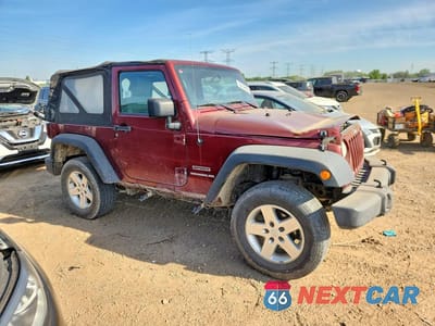 Czwarte zdjęcie samochodu z boku: 2010 JEEP WRANGLER SPORT VIN:1J4AA2D14AL155189 - miniatura