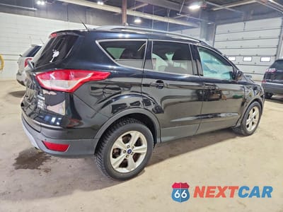 Trzecie zdjęcie samochodu z tyłu: 2016 FORD ESCAPE SE VIN:1FMCU0GX3GUB43544 - miniatura