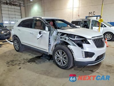 Czwarte zdjęcie samochodu z boku: 2022 CADILLAC XT5 PREMIUM LUXURY VIN:1GYKNDRS4NZ174107 - miniatura