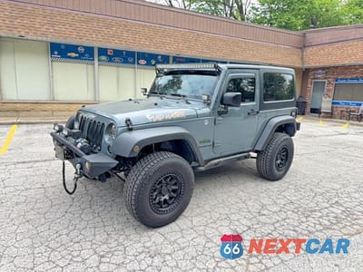 Drugie zdjęcie samochodu z przodu: 2015 JEEP WRANGLER SPORT VIN:1C4AJWAG8FL718516 - miniatura