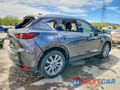 Trzecie zdjęcie samochodu z tyłu: 2019 MAZDA CX-5 GRAND TOURING RESERVE VIN:JM3KFBDY2K0625464 - miniatura
