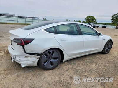 Trzecie zdjęcie samochodu z tyłu: 2019 TESLA MODEL 3 VIN:5YJ3E1EB3KF511544 - miniatura