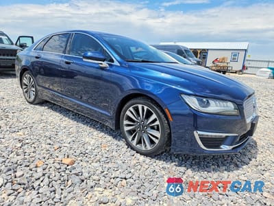 Czwarte zdjęcie samochodu z boku: 2017 LINCOLN MKZ RESERVE VIN:3LN6L5E95HR648737 - miniatura