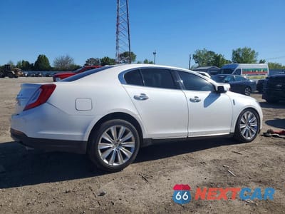 Trzecie zdjęcie samochodu z tyłu: 2015 LINCOLN MKS VIN:1LNHL9FTXFG606109 - miniatura