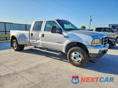 Czwarte zdjęcie samochodu z boku: 2004 FORD F350 SUPER DUTY VIN:1FTWW33PX4ED89547 - miniatura