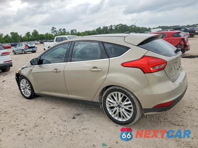 Drugie zdjęcie samochodu z przodu: 2015 FORD FOCUS TITANIUM VIN:1FADP3N21FL268836 - miniatura