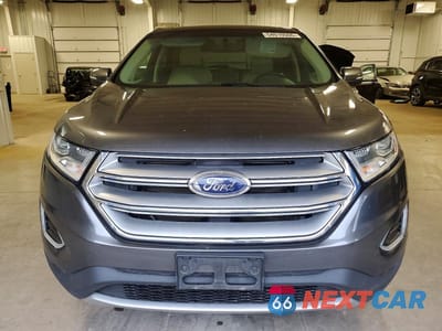 Piąte zdjęcie samochodu w środku: 2015 FORD EDGE TITANIUM VIN:2FMPK4K97FBB19209 - miniatura