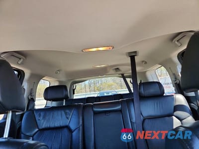Zdjęcie 10 z 13 samochodu: 2011 HONDA PILOT EXL VIN:5FNYF4H5XBB062938 - miniatura