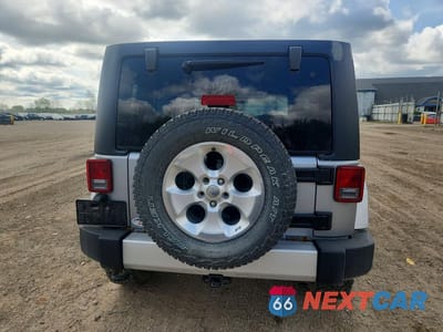 Zdjęcie 6 z 13 samochodu: 2013 JEEP WRANGLER UNLIMITED SAHARA VIN:1C4BJWEG3DL635829 - miniatura
