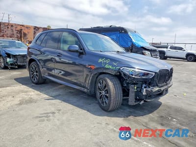 Czwarte zdjęcie samochodu z boku: 2022 BMW X5 XDRIVE45E VIN:5UXTA6C04N9L20593 - miniatura