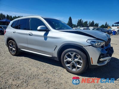 Czwarte zdjęcie samochodu z boku: 2021 BMW X3 XDRIVE30E VIN:5UXTS1C08M9F53930 - miniatura