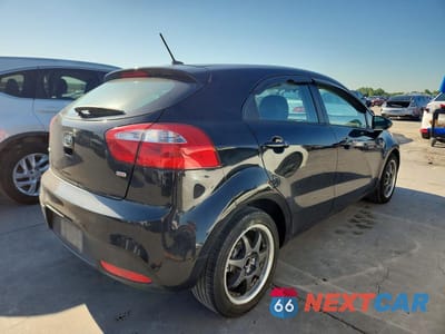 Trzecie zdjęcie samochodu z tyłu: 2012 KIA RIO LX VIN:KNADM5A39C6039342 - miniatura