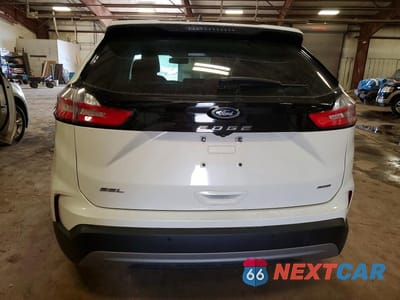 Zdjęcie 6 z 13 samochodu: 2022 FORD EDGE SEL VIN:2FMPK4J92NBA14321 - miniatura