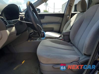 Zdjęcie 7 z 12 samochodu: 2006 KIA OPTIMA LX VIN:KNAGE123865074210 - miniatura