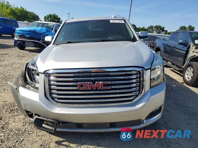 Piąte zdjęcie samochodu w środku: 2018 GMC YUKON XL C1500 SLT VIN:1GKS1GKC0JR182838 - miniatura