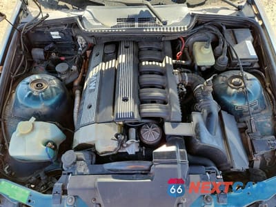 Zdjęcie 11 z 12 samochodu: 1994 BMW 325 IC AUTOMATIC VIN:WBABJ632XRJD32606 - miniatura