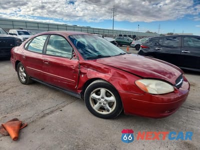 Czwarte zdjęcie samochodu z boku: 2001 FORD TAURUS SES VIN:1FAFP55271G233210 - miniatura