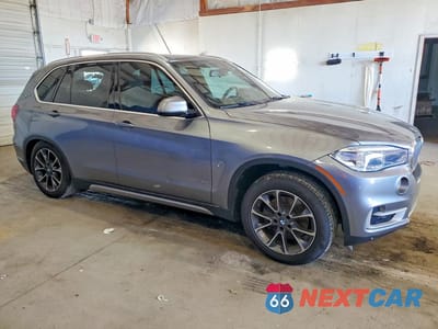 Czwarte zdjęcie samochodu z boku: 2018 BMW X5 XDR40E VIN:5UXKT0C50J0W02064 - miniatura