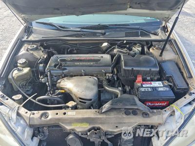 Zdjęcie 11 z 12 samochodu: 2005 TOYOTA CAMRY LE VIN:4T1BE30KX5U414945 - miniatura