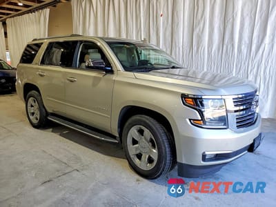 Czwarte zdjęcie samochodu z boku: 2015 CHEVROLET TAHOE K1500 LTZ VIN:1GNSKCKC0FR509139 - miniatura