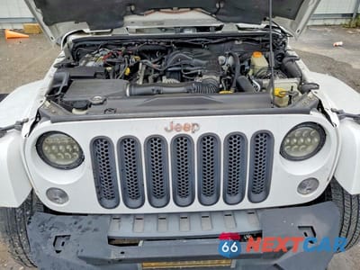 Zdjęcie 12 z 13 samochodu: 2014 JEEP WRANGLER UNLIMITED SAHARA VIN:1C4BJWEG5EL146902 - miniatura