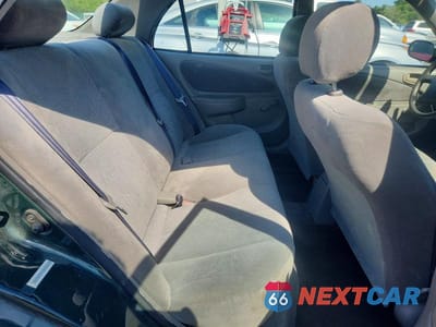 Zdjęcie 10 z 12 samochodu: 2002 TOYOTA COROLLA CE VIN:2T1BR12EX2C565233 - miniatura