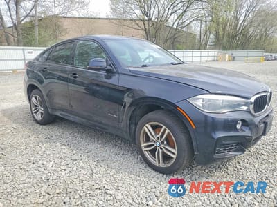 Czwarte zdjęcie samochodu z boku: 2015 BMW X6 XDRIVE35I VIN:5UXKU2C51F0F95922 - miniatura