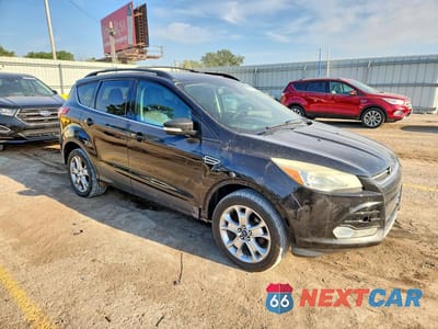 Czwarte zdjęcie samochodu z boku: 2013 FORD ESCAPE SEL VIN:1FMCU0HX7DUD52568 - miniatura