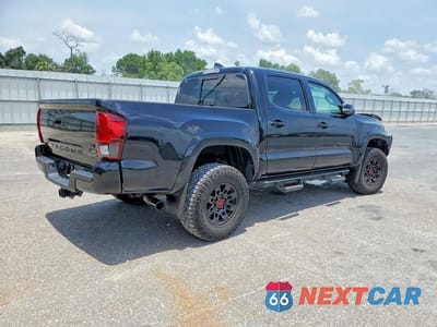 Trzecie zdjęcie samochodu z tyłu: 2022 TOYOTA TACOMA SR5 V6 VIN:3TMAZ5CN2NM162814 - miniatura