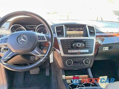 Zdjęcie 9 z 10 samochodu: 2014 MERCEDES-BENZ GL 450 4MATIC VIN:4JGDF7CE1EA304161 - miniatura