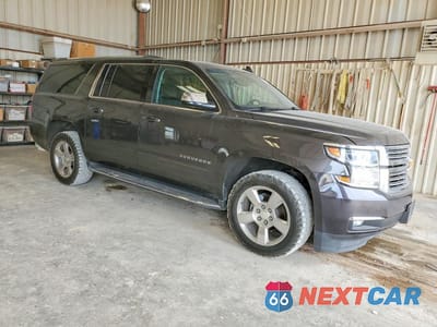 Czwarte zdjęcie samochodu z boku: 2018 CHEVROLET SUBURBAN K1500 PREMIER VIN:1GNSKJKC7JR247004 - miniatura
