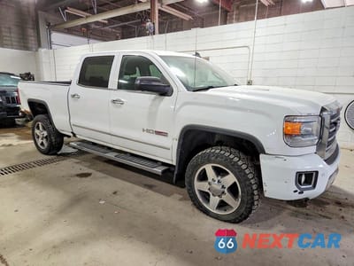 Czwarte zdjęcie samochodu z boku: 2016 GMC SIERRA K2500 SLT VIN:1GT12TE82GF162900 - miniatura