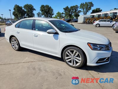 Czwarte zdjęcie samochodu z boku: 2019 VOLKSWAGEN PASSAT WOLFSBURG VIN:1VWLA7A3XKC004938 - miniatura