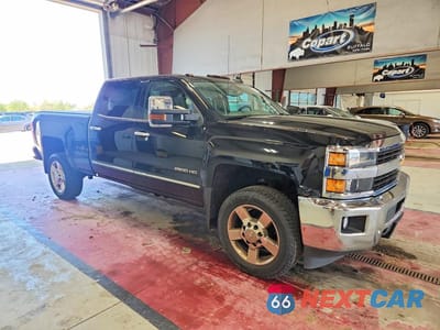 Czwarte zdjęcie samochodu z boku: 2016 CHEVROLET SILVERADO K2500 HEAVY DUTY LTZ VIN:1GC1KWEG0GF278900 - miniatura