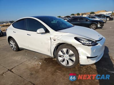 Czwarte zdjęcie samochodu z boku: 2023 TESLA MODEL Y VIN:7SAYGDEE7PA079088 - miniatura