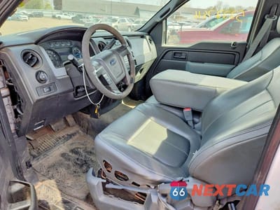 Zdjęcie 7 z 12 samochodu: 2014 FORD F150 VIN:1FTMF1CM7EKF77804 - miniatura