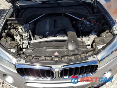 Zdjęcie 11 z 12 samochodu: 2014 BMW X5 SDRIVE35I VIN:5UXKR2C54E0H33792 - miniatura