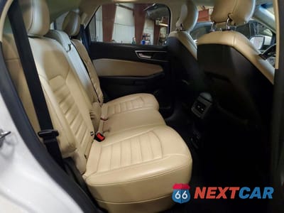 Zdjęcie 11 z 13 samochodu: 2015 FORD EDGE SEL VIN:2FMTK4J97FBC36210 - miniatura