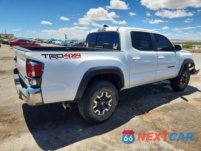 Trzecie zdjęcie samochodu z tyłu: 2022 TOYOTA TACOMA TRD OFF-ROAD VIN:3TMCZ5AN9NM470364 - miniatura