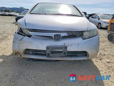 Piąte zdjęcie samochodu w środku: 2007 HONDA CIVIC LX VIN:2HGFA16507H309622 - miniatura