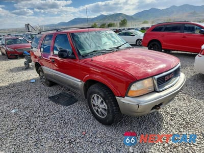 Czwarte zdjęcie samochodu z boku: 1998 GMC JIMMY VIN:1GKDT13W2W2528140 - miniatura