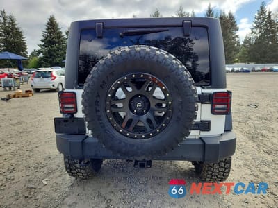 Zdjęcie 6 z 12 samochodu: 2014 JEEP WRANGLER UNLIMITED SPORT VIN:1C4BJWDG5EL145797 - miniatura