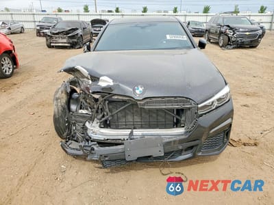 Piąte zdjęcie samochodu w środku: 2022 BMW 750 XI VIN:WBA7U2C03NCJ39116 - miniatura