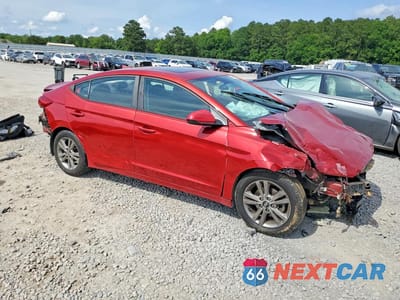 Czwarte zdjęcie samochodu z boku: 2017 HYUNDAI ELANTRA VALUE EDITION VIN:KMHD84LF5HU241232 - miniatura
